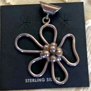 Silver flower pendant